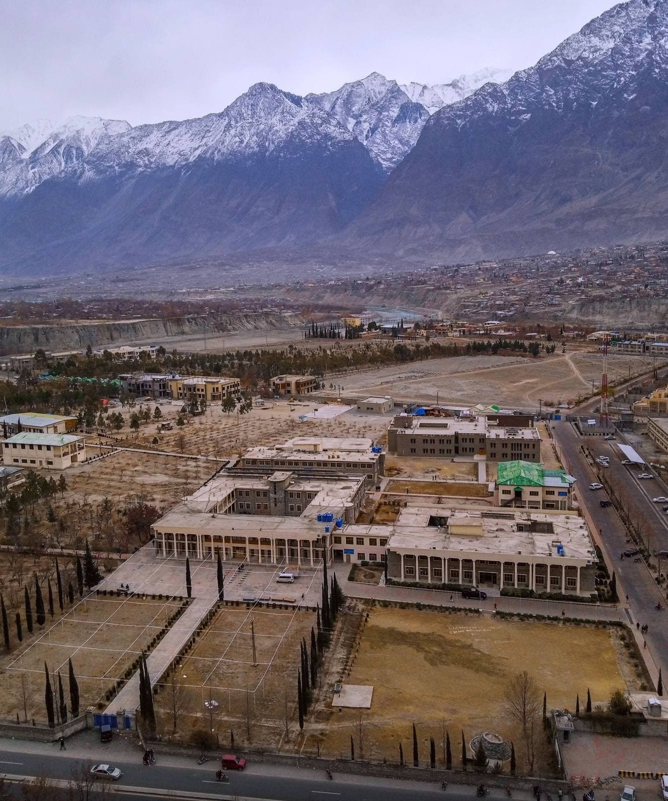 Gilgit city beneath snowy mountains