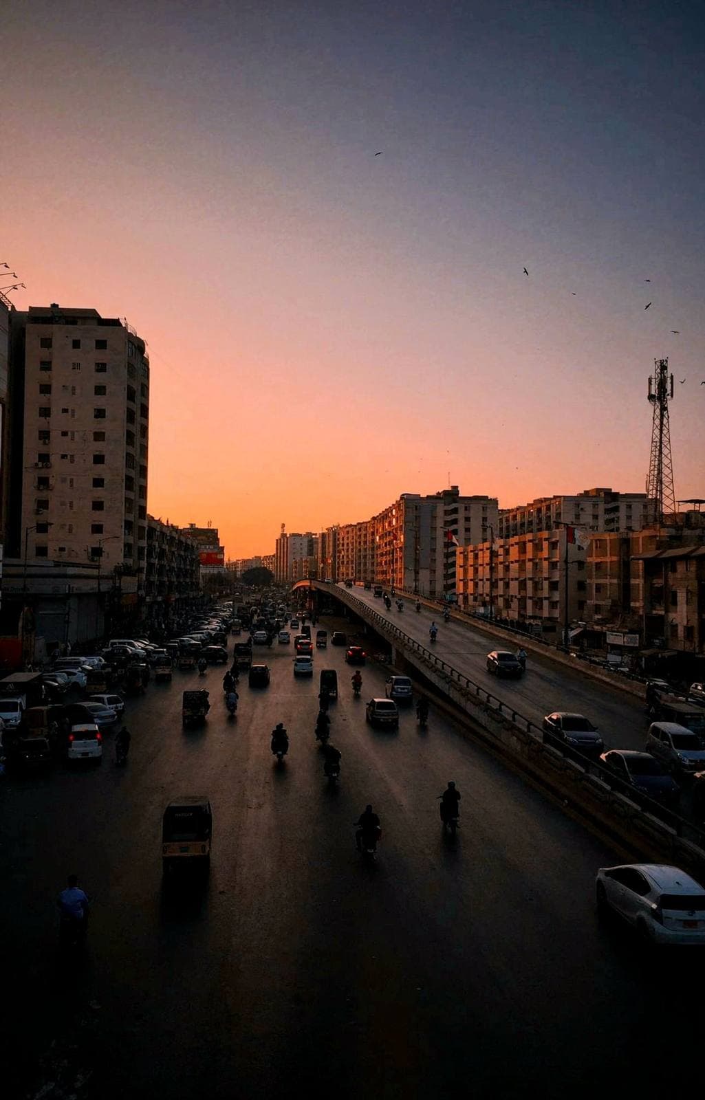 Sunset over a busy road in Rawalpindi
